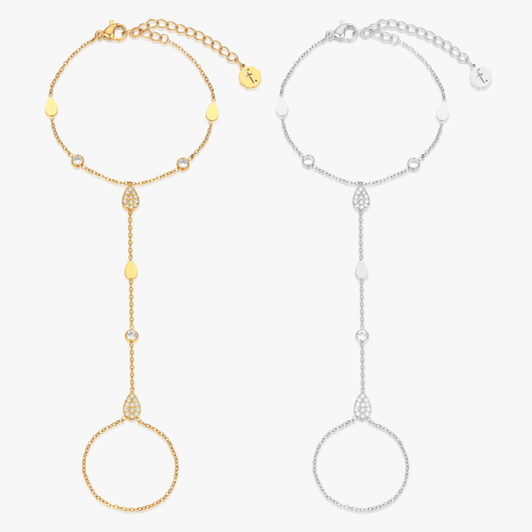 Tear Drop CZ Hand Chain featuring a delicate wrist-to-finger chain adorned with clear CZ stones and a pavé teardrop connector, available in yellow-gold and white-gold tones.