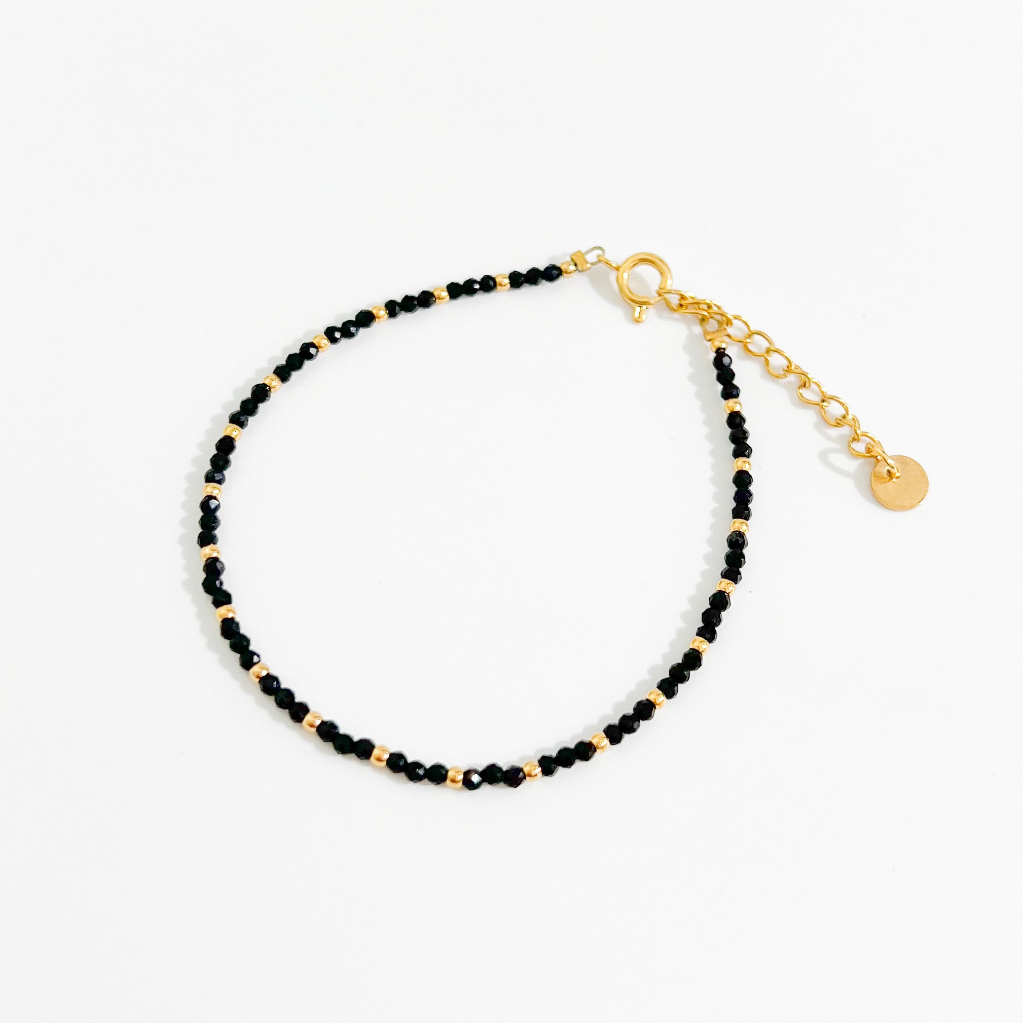 Black Beaded Bracelet in Gold - Flaire & Co.