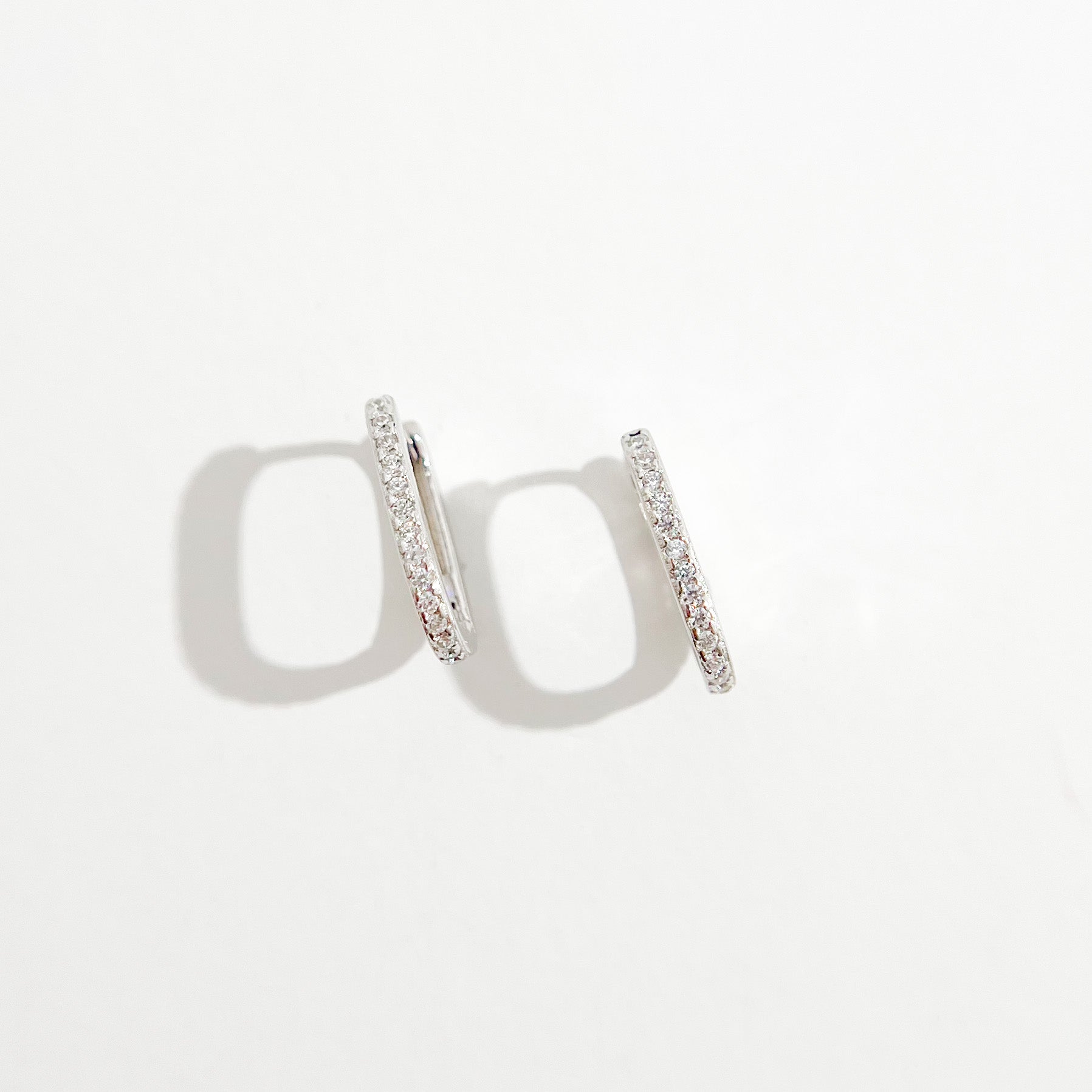 Oval Pave Huggies in Silver - Flaire & Co.